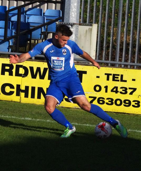 Ashley Bevan crosses into the box Ashley Bevan crosses into the box